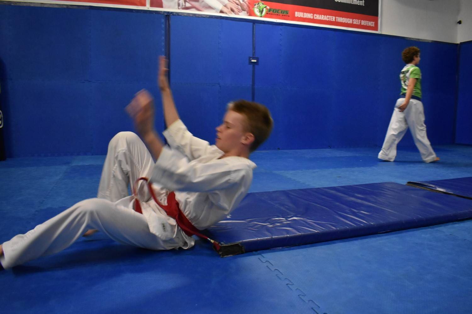 kids practicing martial arts showing physical fitness benefits