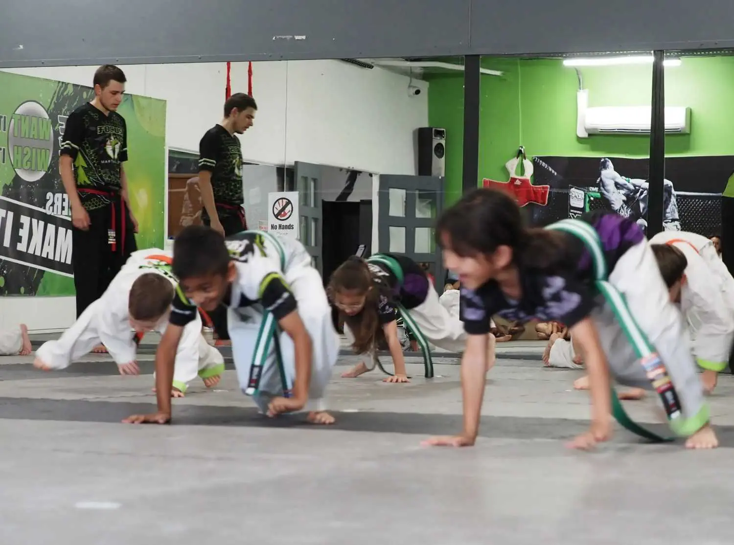 kids doing drills for BJJ lessons