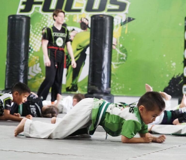 Kids' BJJ classes focusing on functional movement, agility, and physical conditioning for young athletes.