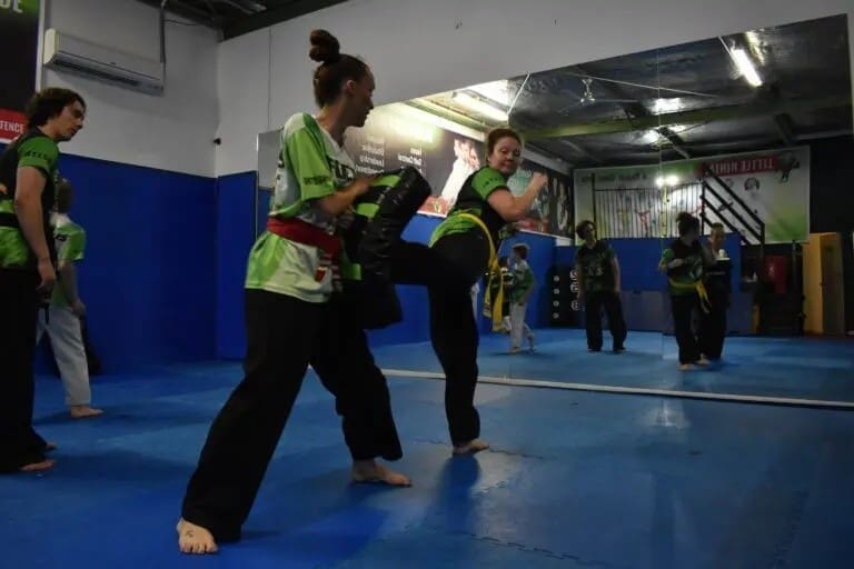 student doing kicks for adult taekwondo lessons