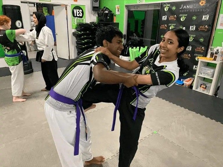 students sparring during adult karate lessons